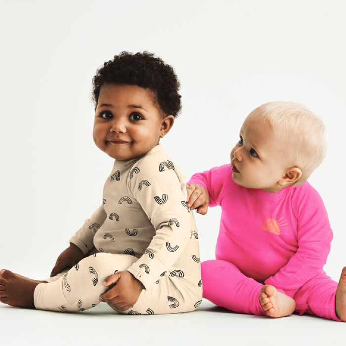 Vanillefarbener Baby-Pyjama mit Reißverschluss und Regenbögen aus Bio-Baumwolle - DIM ZIPPY®. , , DIM