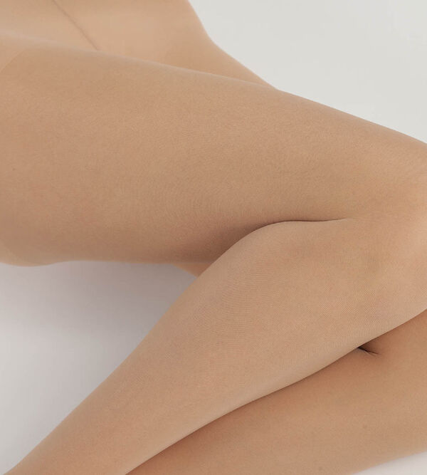 Women's Light Beige Ultra Resist skin colour sheer tights made of
